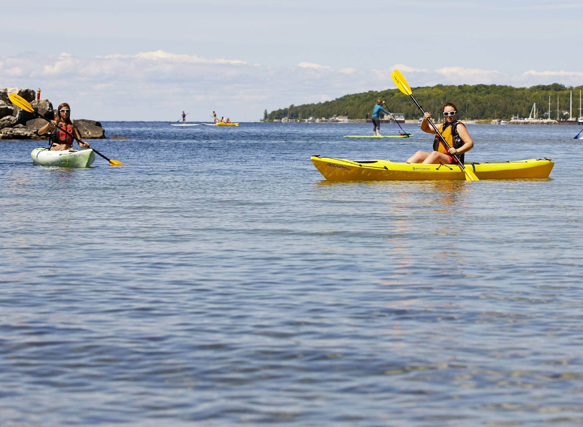 People kayaking on the lake