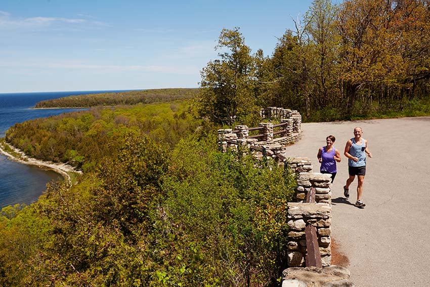 Where to Host a Reunion in Door County People running past a lookout