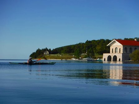 Stone boathouse on the edge of the lake.