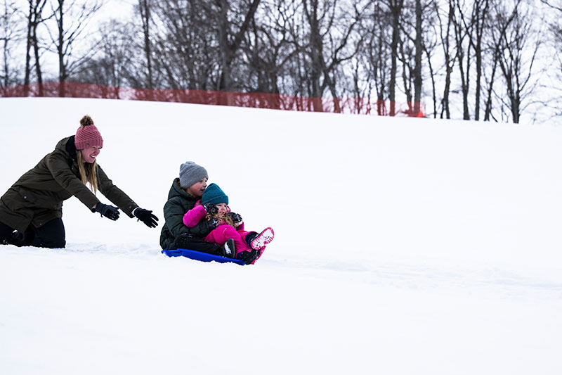 Kids sledding at Hill 17