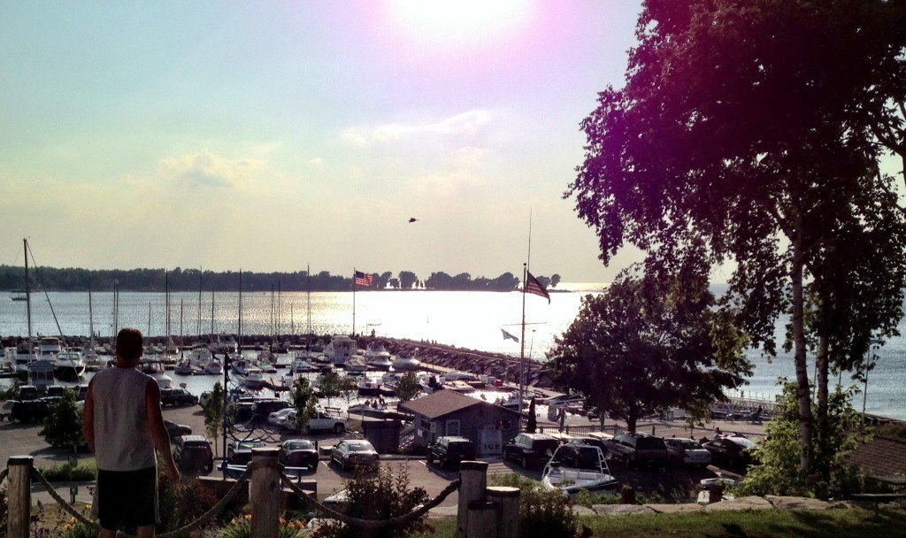 A person looking out at the marina.