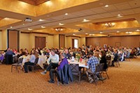 A group of people at the tourism breakfast.