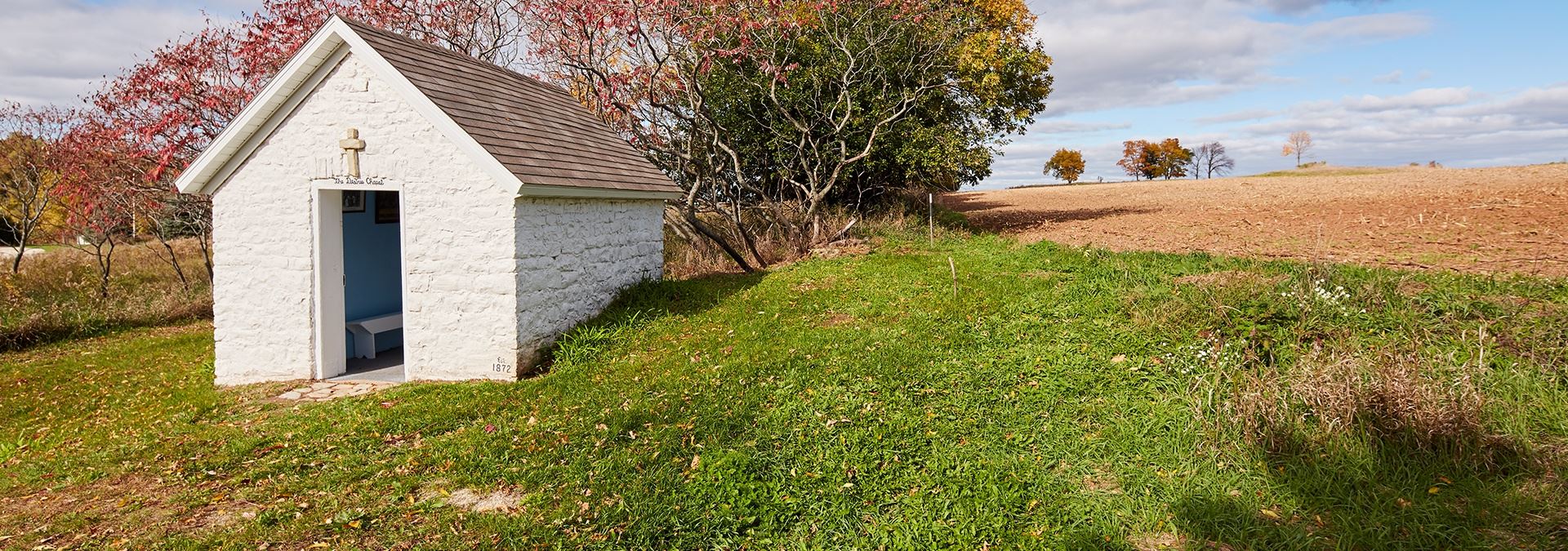 A small white stone chapel.