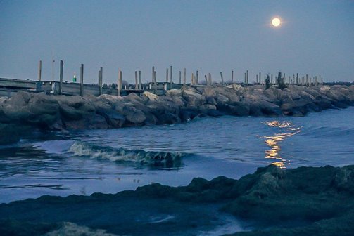 Winter waves near a pier