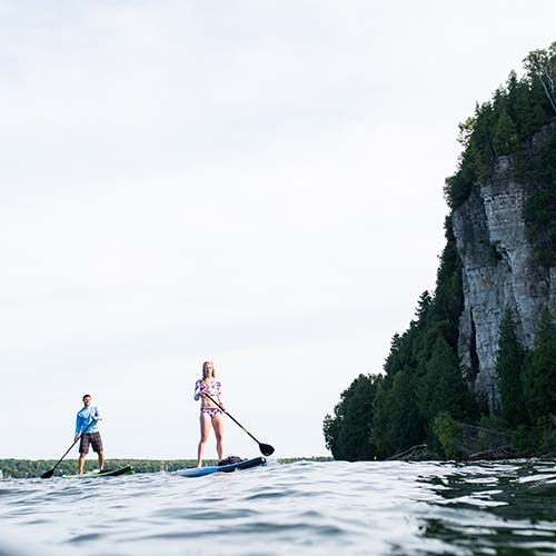 Ephraim Two people standup paddle boarding